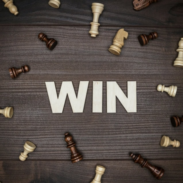 Word Win On Wooden Background